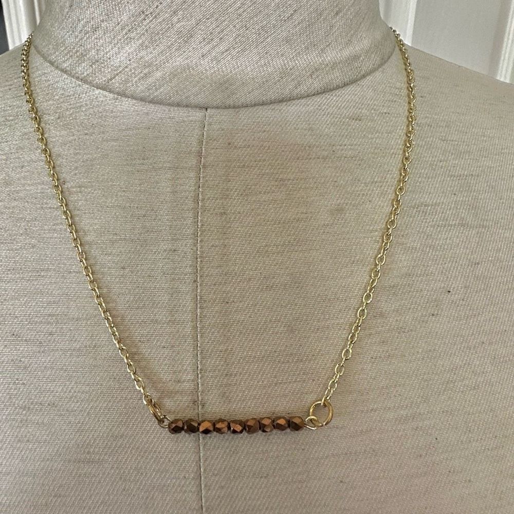 Gold tone copper bead bar necklace